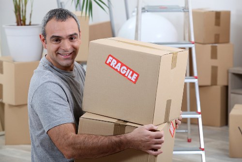Moving home planning in Barnes with boxes and packed furniture