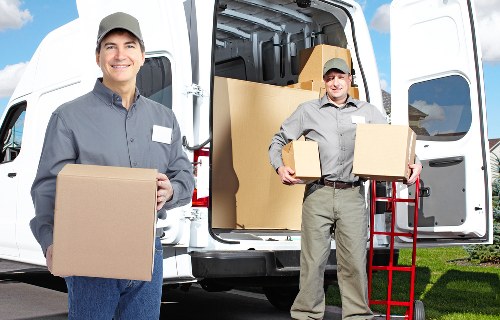 Careful loading of household items for a Barnes removals service